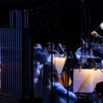 Carl St.Clair conducting Pacific Symphony at FivePoint Amphitheatre in Sept. 2022.